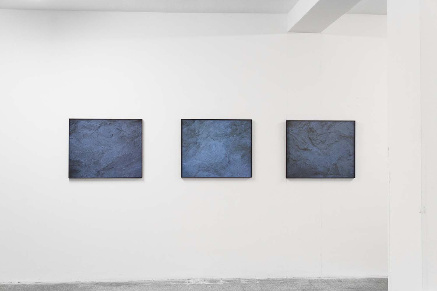 Indacoterra, exhibition view, 2019 Giclée prints, 70x85cm each; cyanotype on raw alabaster - Lidia Bianchi -  courtesy of the artist